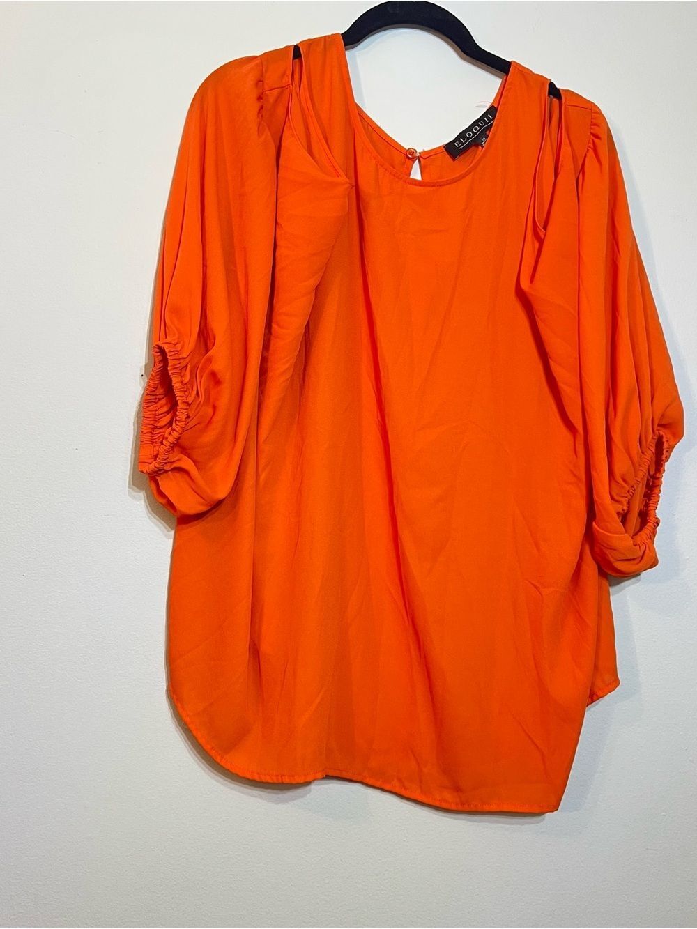 Vibrant Orange Blouse with Flowing Sleeves